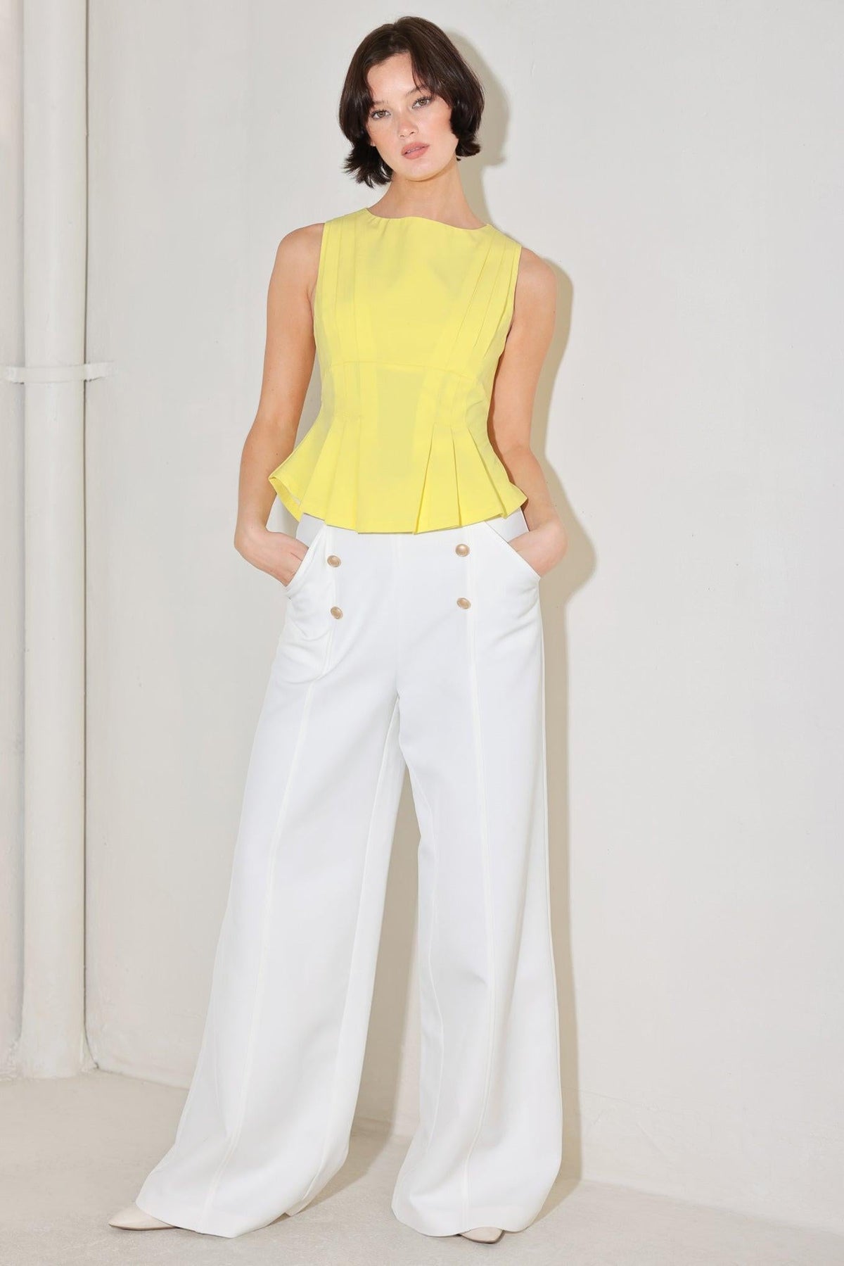 MODERN SHAPE YELLOW WOVEN TOP